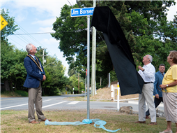 Larry Borserio (son of Jim) unveils the new Jim Borserio Way sign