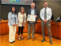 Mayor Krog presents City Staff with the 2023 Gold Award of Excellence in Policy Planning
