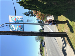 Photo of Artist with Street Banners Installed