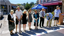 The official first bollard drop at the corner of Bastion and Commercial Streets