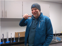 Water Resources Manger, Bill Sims, samples filtered water