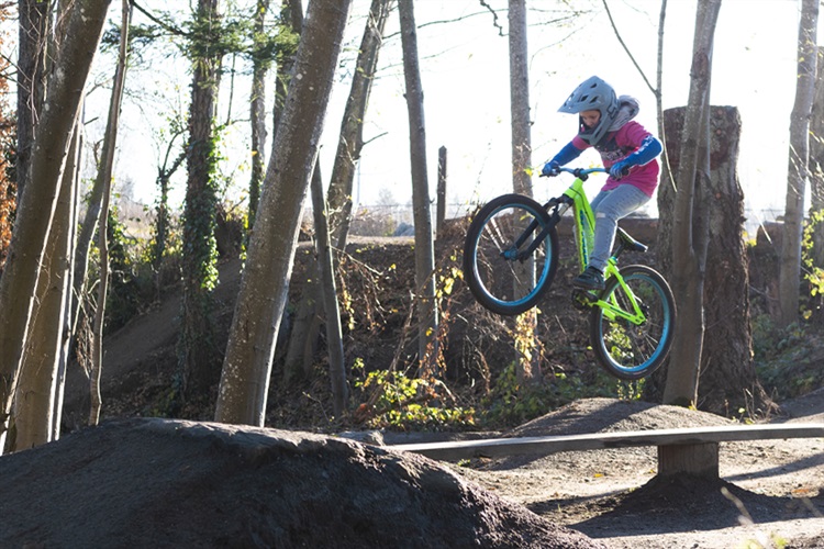 young rider jumps his bike