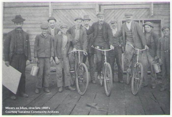Miners on bikes circa late 1800s
