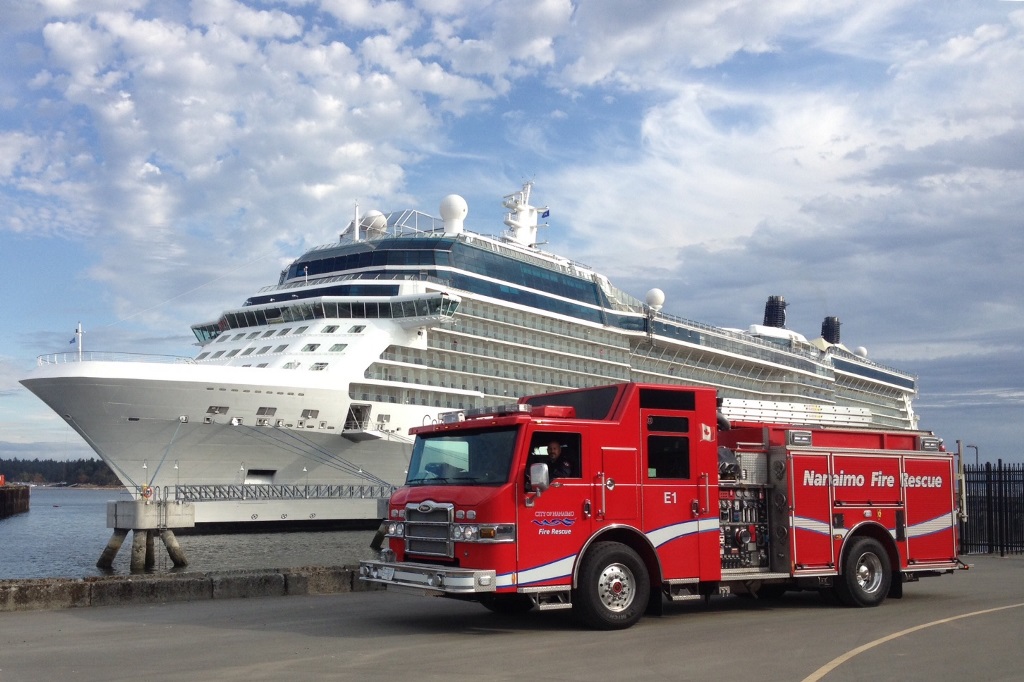 Fire Truck with cruiseship behind it