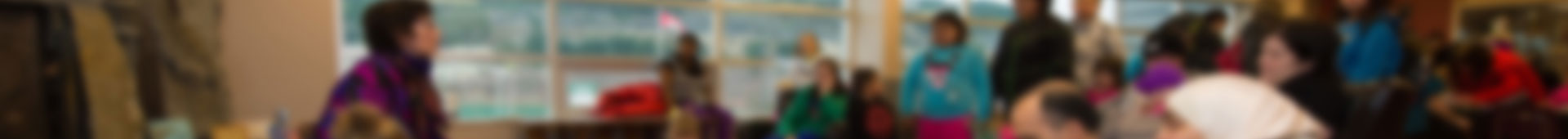 Banner of people in a meeting room
