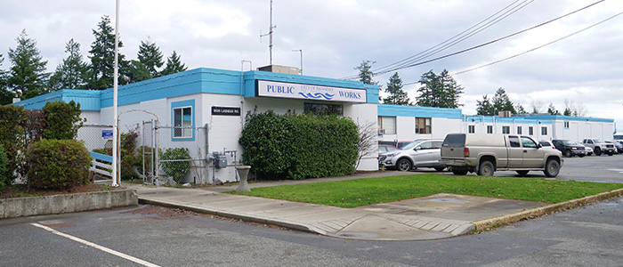 A wide shot of the front of Nanaimo's aging Public Works building