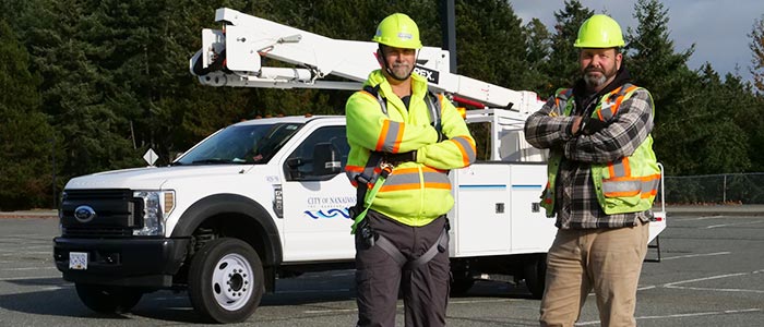 Staff with bucket truck