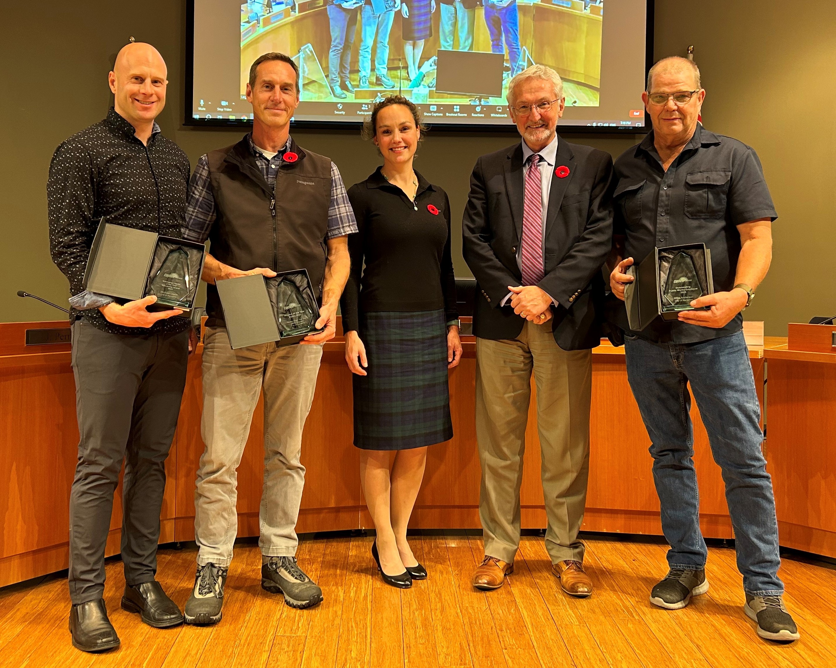 Mayor Krog and city staff pictured holding awards