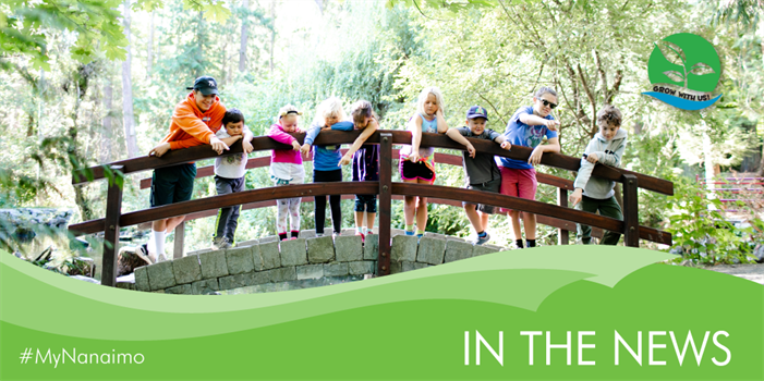 In the news header image of kids on bridge in Bowen Park