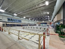Alargeemptypooltankfillsthelowerhalfoftheframe