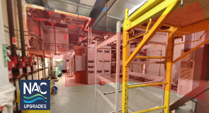 Mechanicalroomwithlargeductselectricalpanelsandanairhandlingunithighlightedforremovalaspartoftheproject